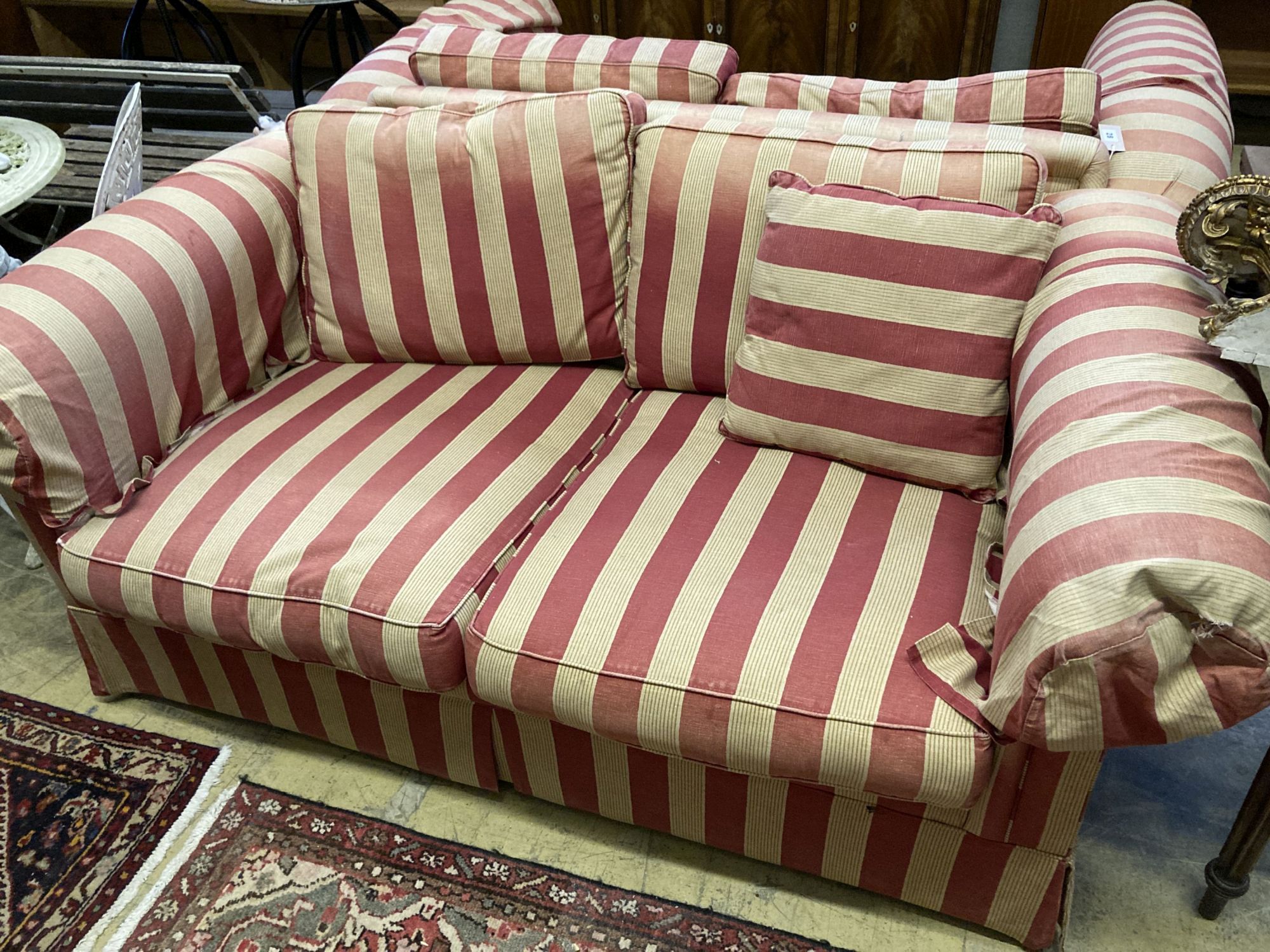 A pair of modern Chesterfied settees with red and cream upholstery (upholstery worn), length 178cm, depth 100cm, height 72cm